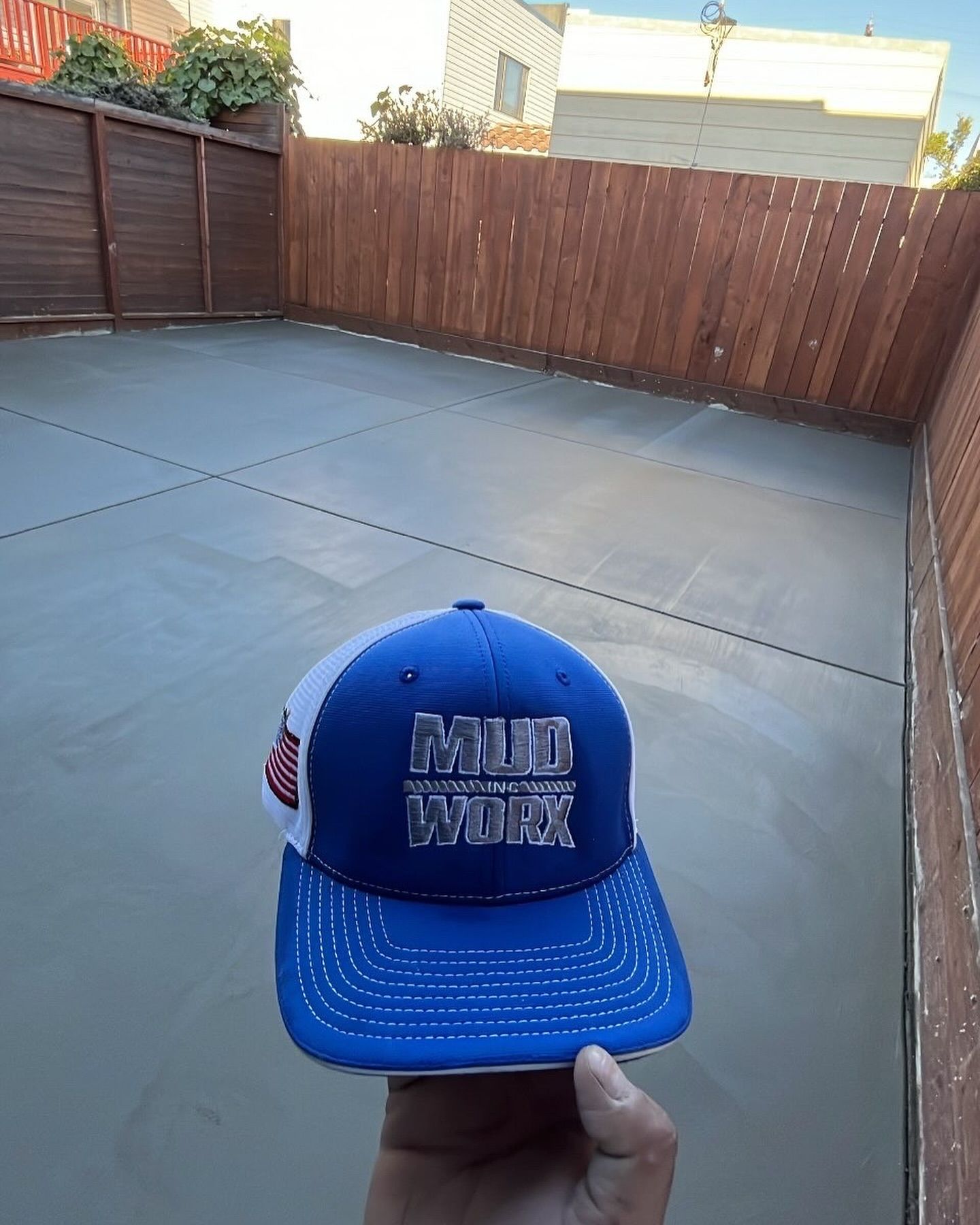 A blue and white trucker-style cap with 