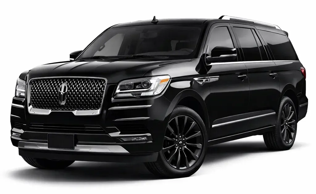 Black Lincoln Navigator SUV with black rims.