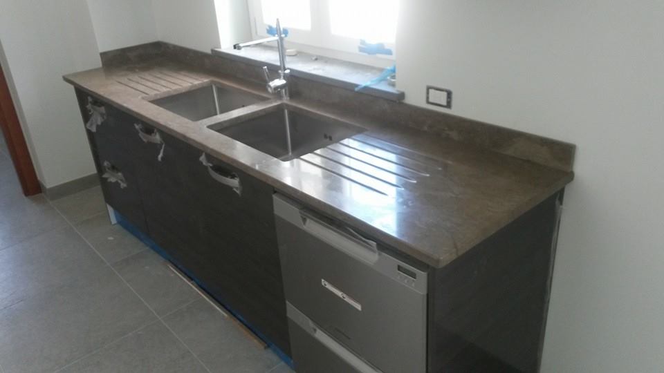kitchen with dark gray stone top