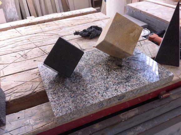 granite slab with stone cubes