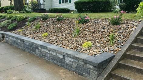 Grey Retaining Wall Stone And Shrubs — Beaver County, PA — McCreary's Lawn Care