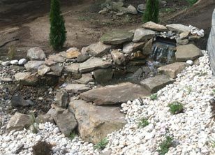 Water Feature On Stones And Pebbles — Beaver County, PA — McCreary's Lawn Care