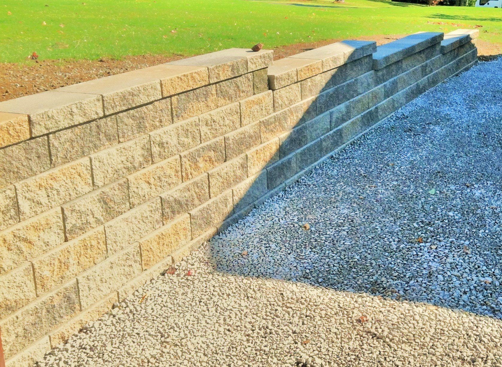 Retaining Wall And Pebble Stones — Beaver County, PA — McCreary's Lawn Care
