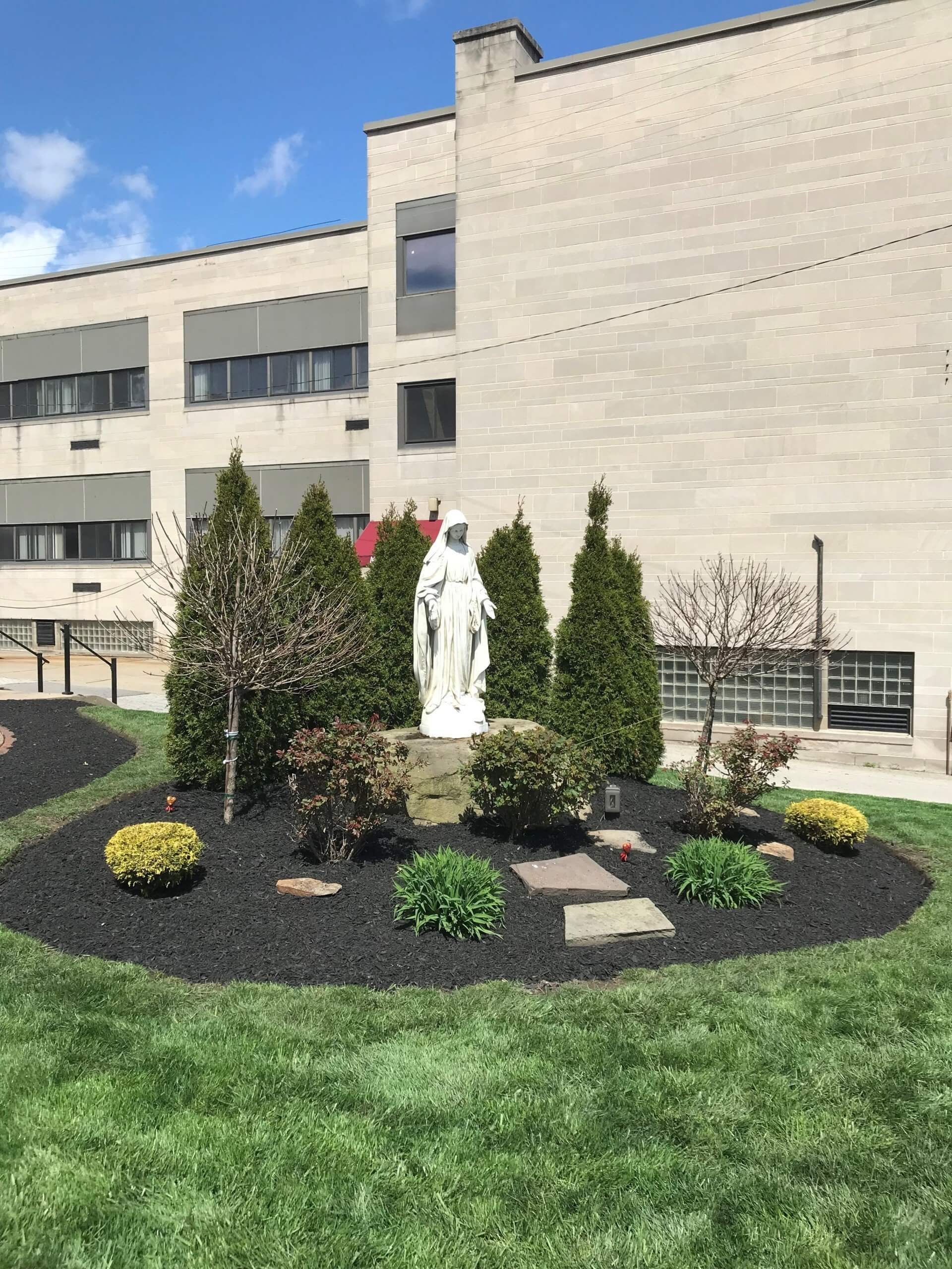 Landscaped Statue — Beaver County, PA — McCreary's Lawn Care
