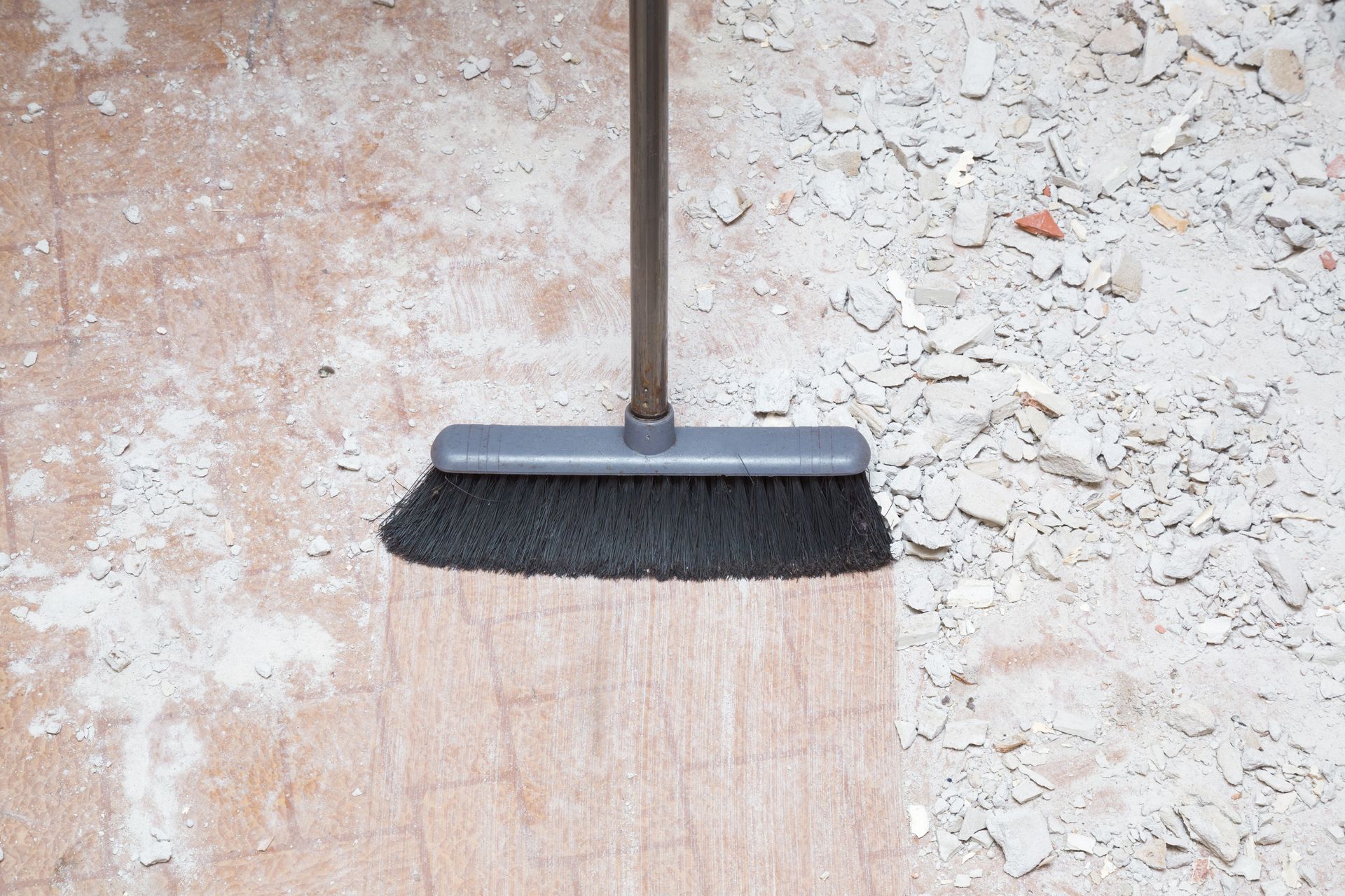 Cleaning cement after construction.