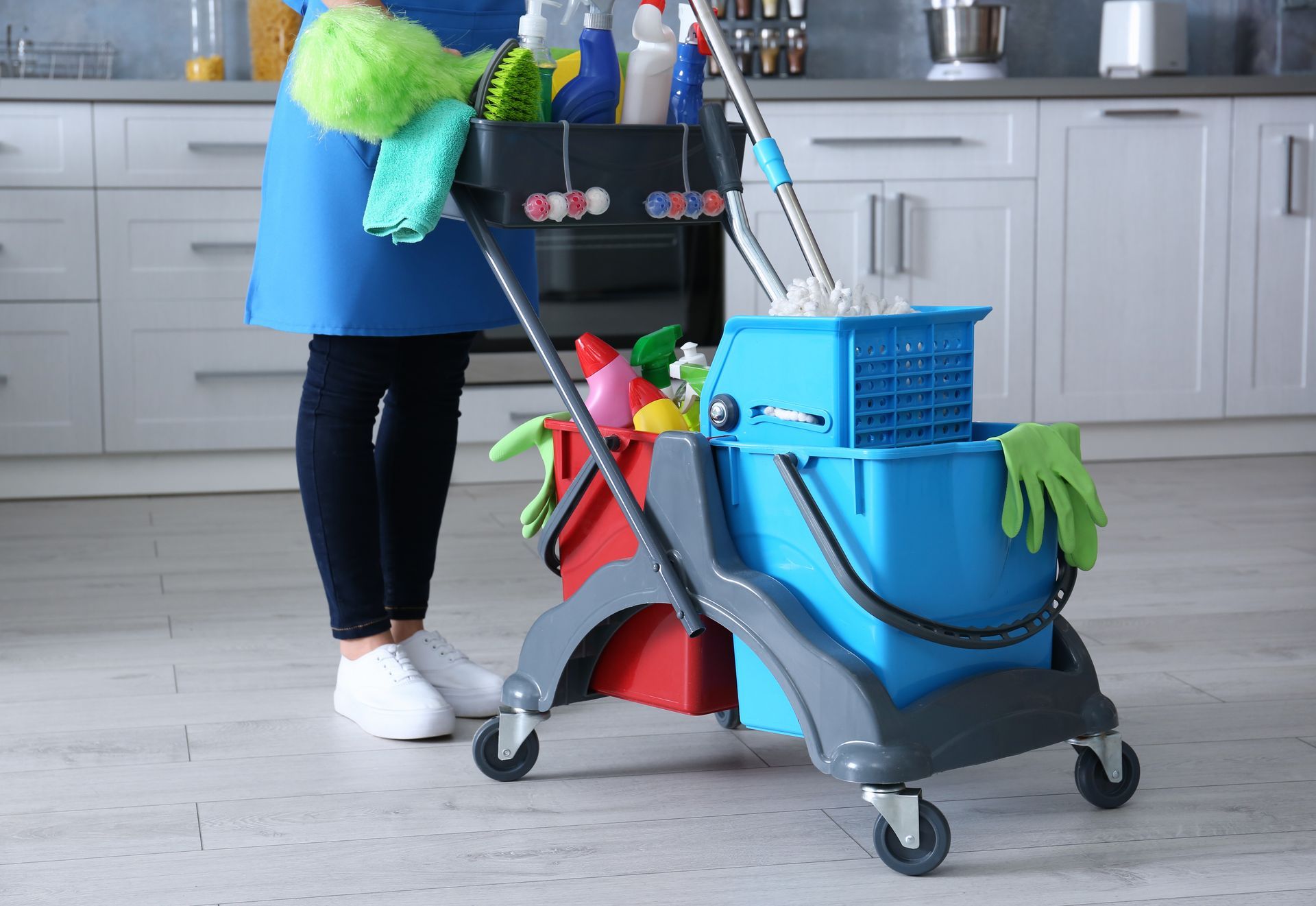 Cleaning a kitchen.