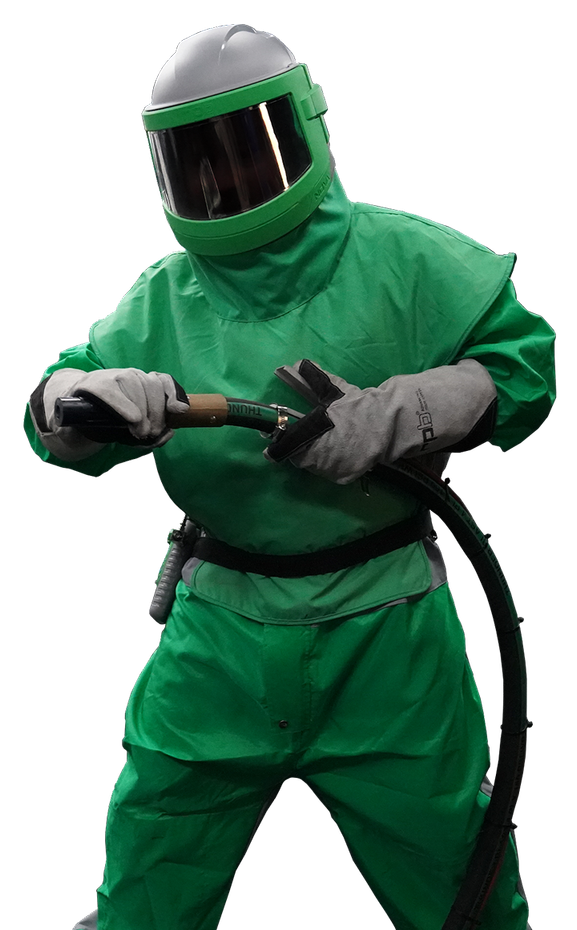 A man in a green suit and helmet is holding a hose