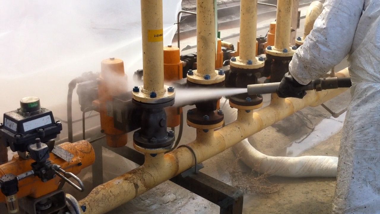 A before and after photo of a set of stairs.