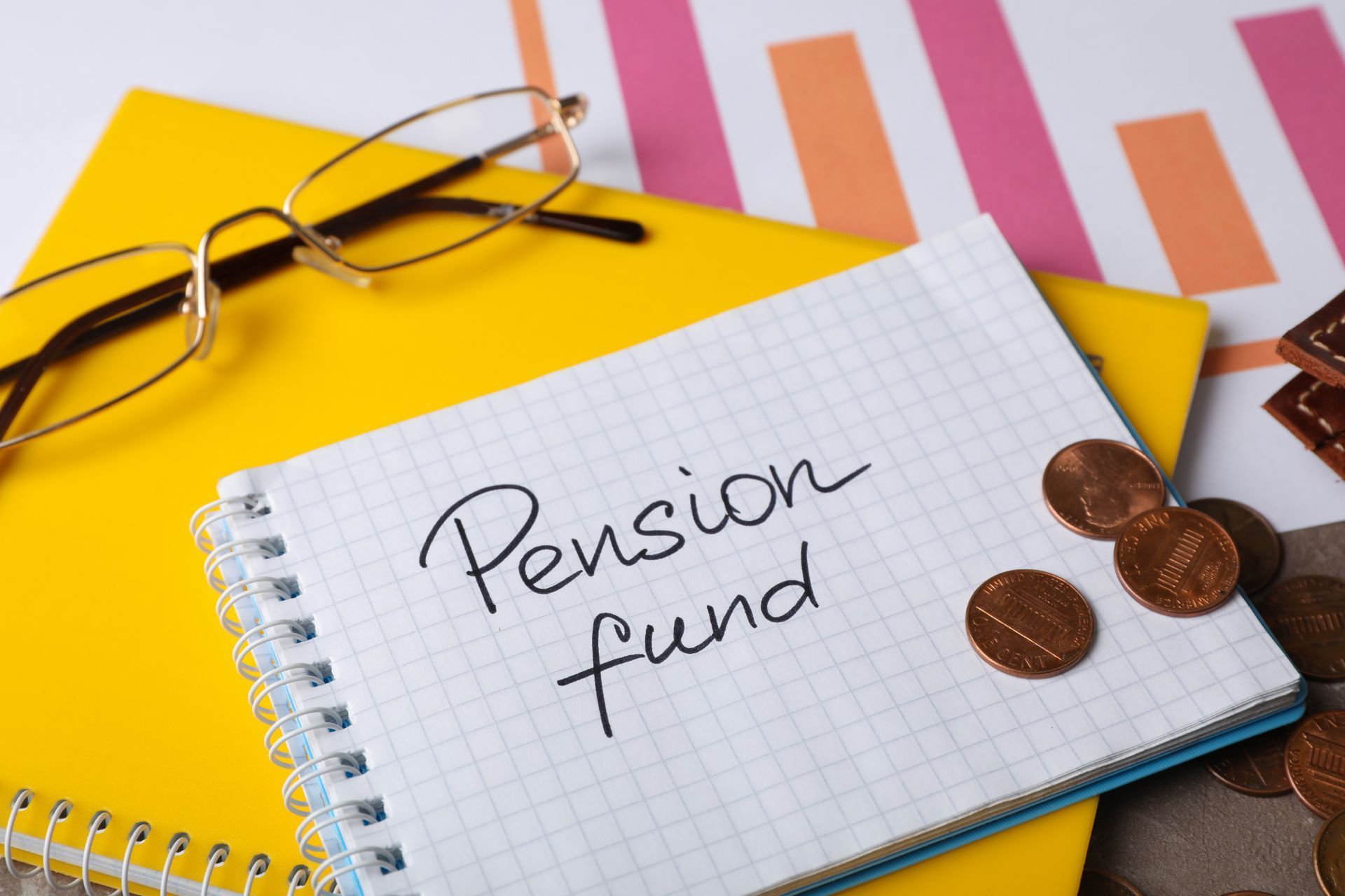 a notebook with the words pension fund written on it