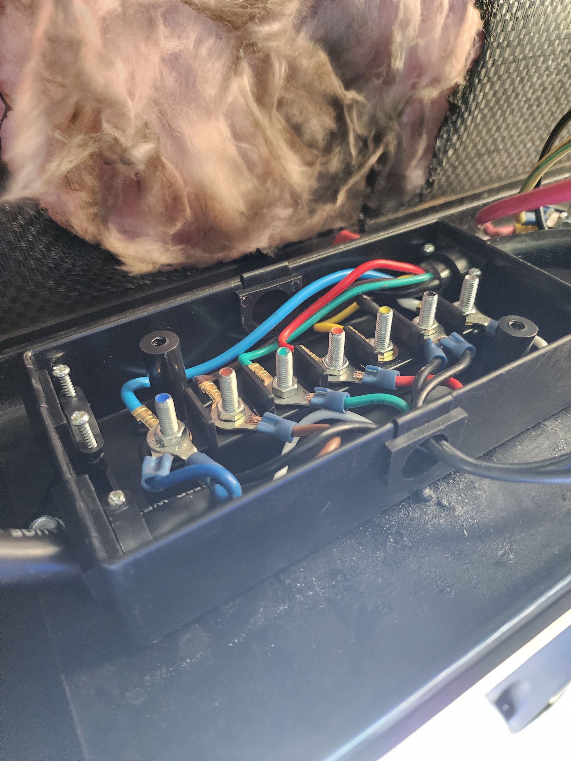 A box with a bunch of wires inside of it