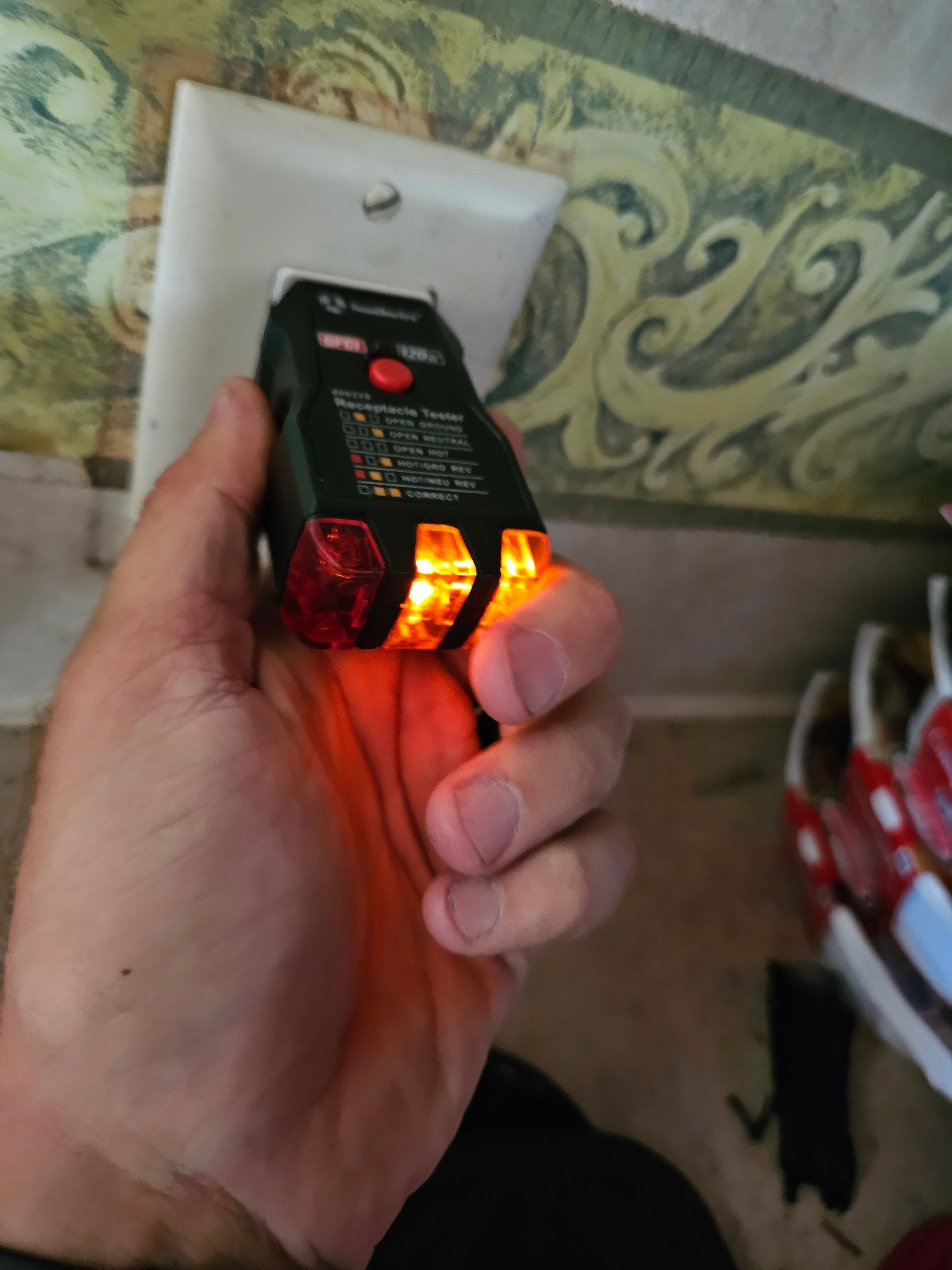 A person is holding a light in their hand