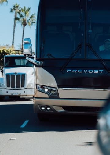 Charter bus rental Arizona on the highway heading to a national park
