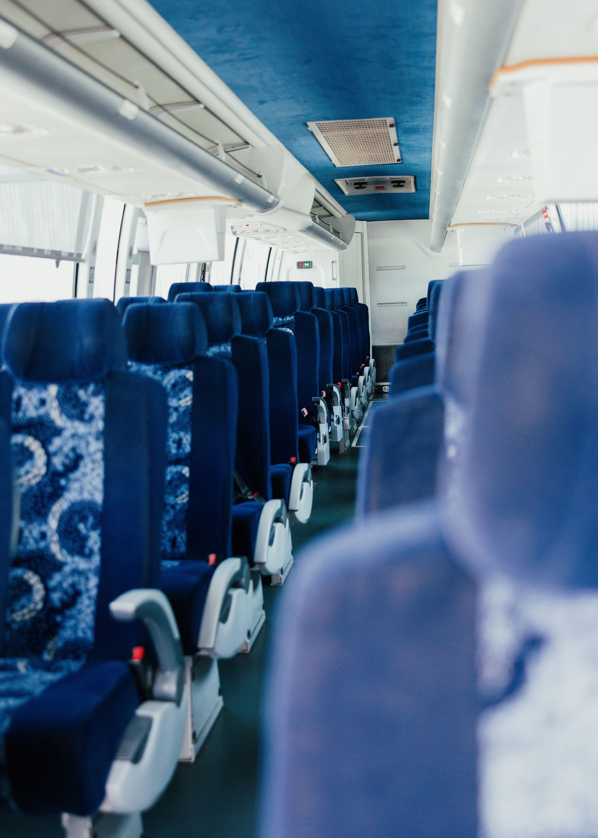 Comfortable seats on a San Diego charter bus designed for long-distance group travel.