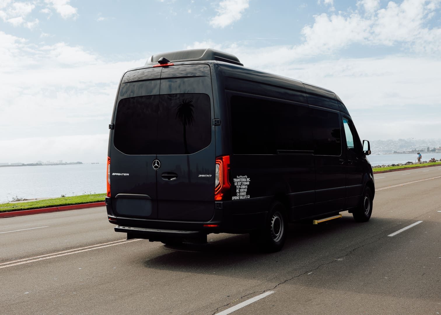 Rear view of sprinter van available for contract transportation and group rentals