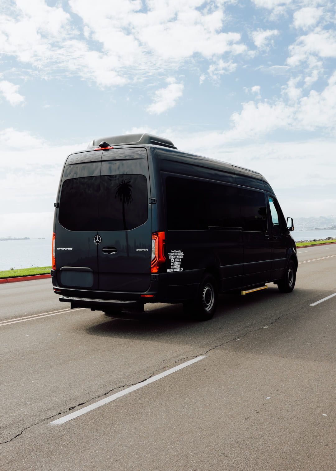 Sprinter van driving on the road in San Diego