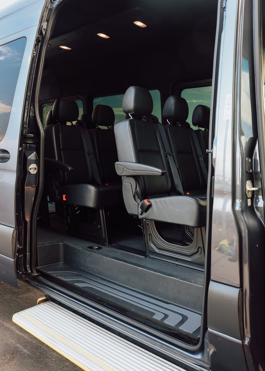 Side angle view of seats in passenger sprinter van rental San Diego
