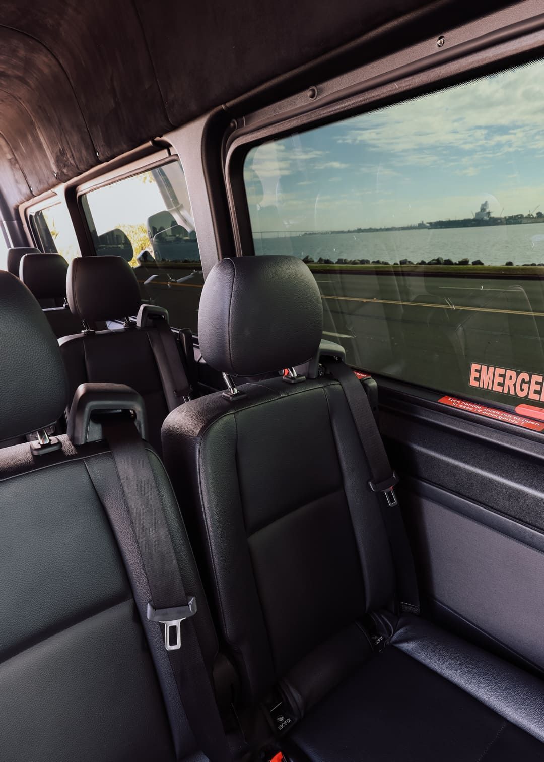 Comfortable seats inside passenger van rental San Diego for groups
