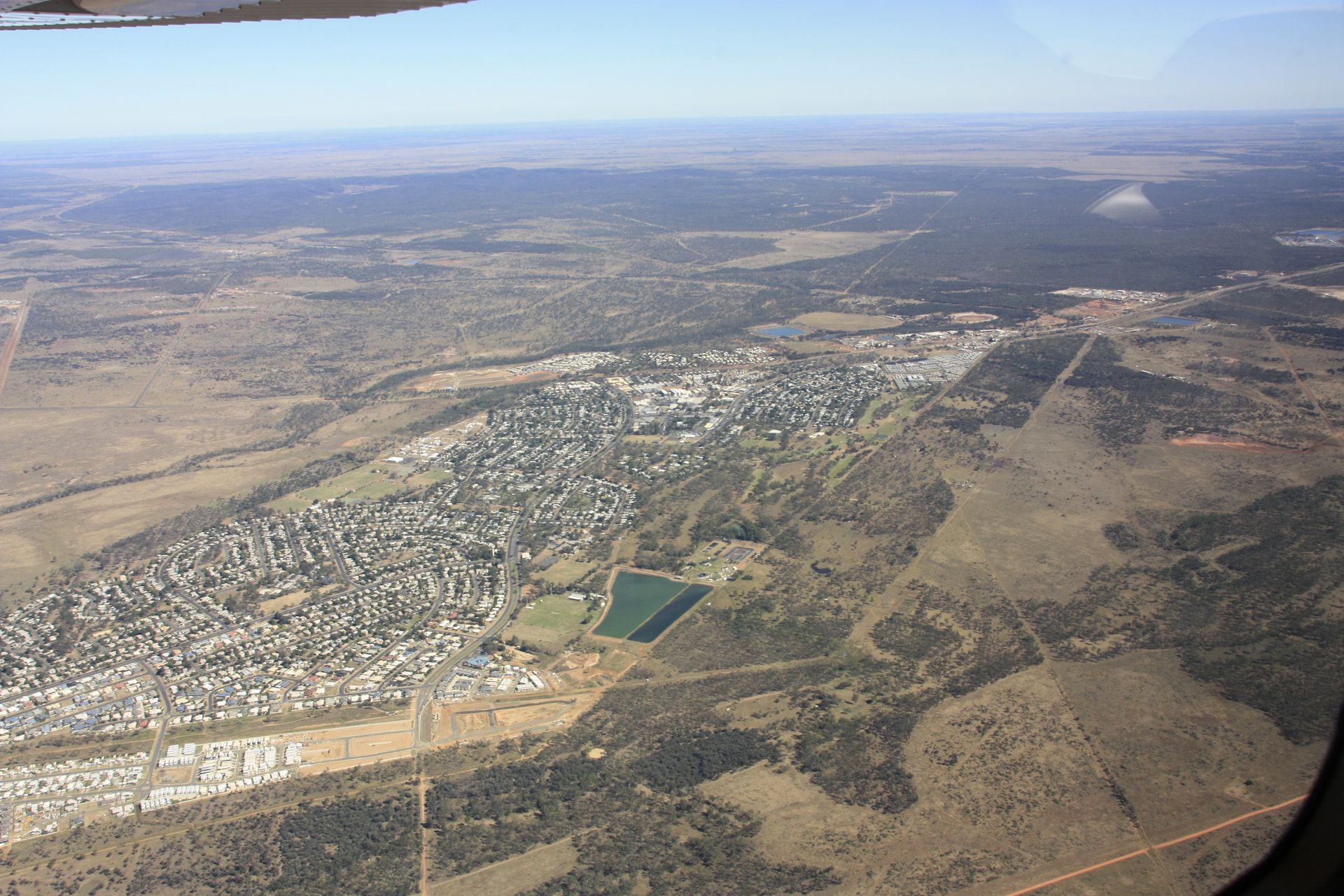 An Aerial View of a Small Town in the Middle of a Desert — Express Couriers Mackay in Moranbah, QLD