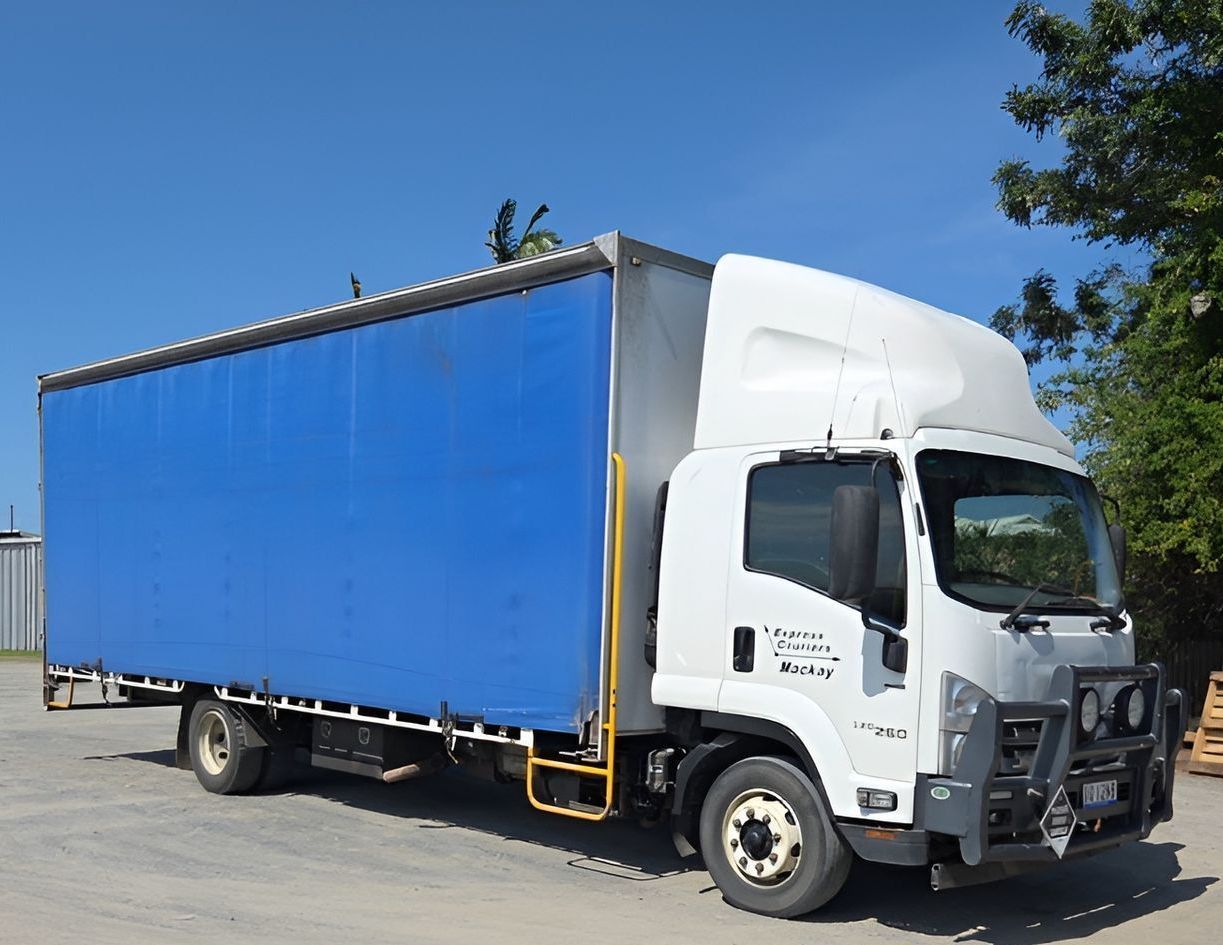 A Person is Holding a Cardboard Box in Their Hands — Express Couriers Mackay in West Mackay, QLD
