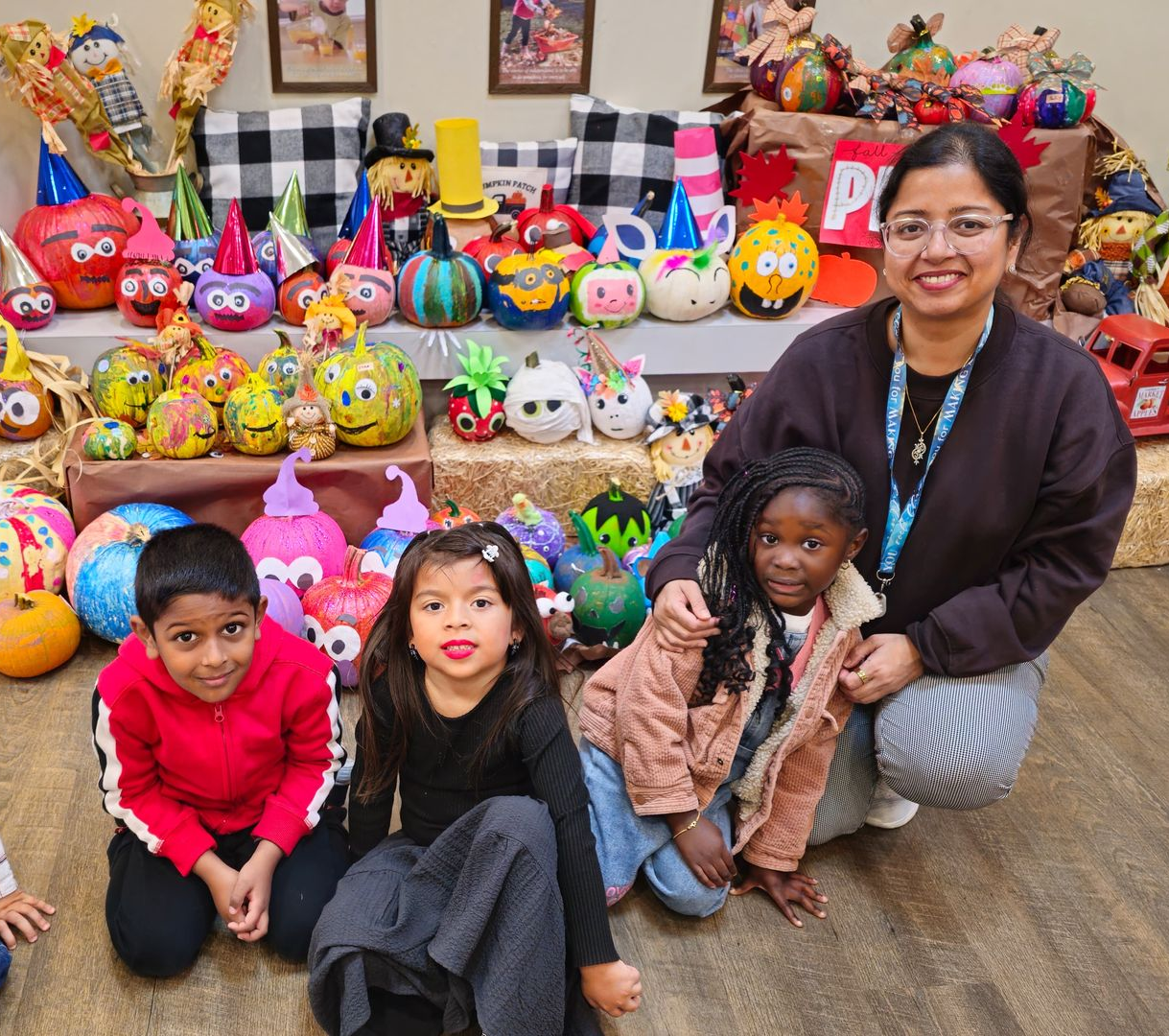 Montessori guide and child in the classroom