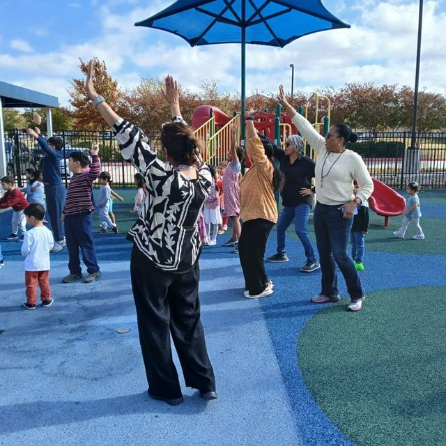 Montessori parents and child during outdoors time