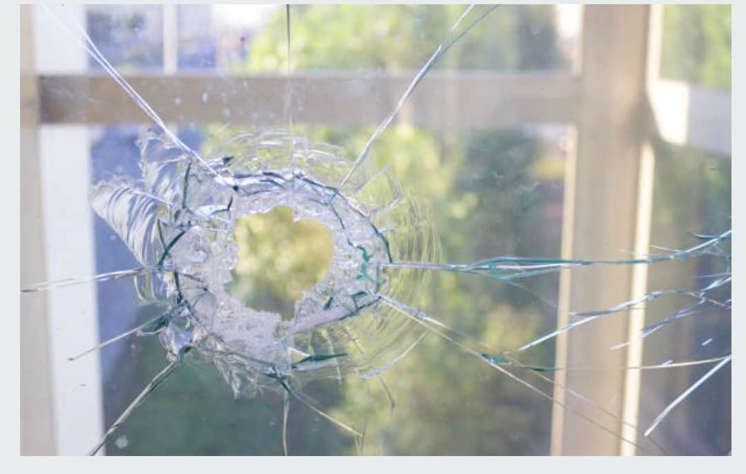 Broken Glass Hole in the Window — Glass Repairs in Dubbo, NSW