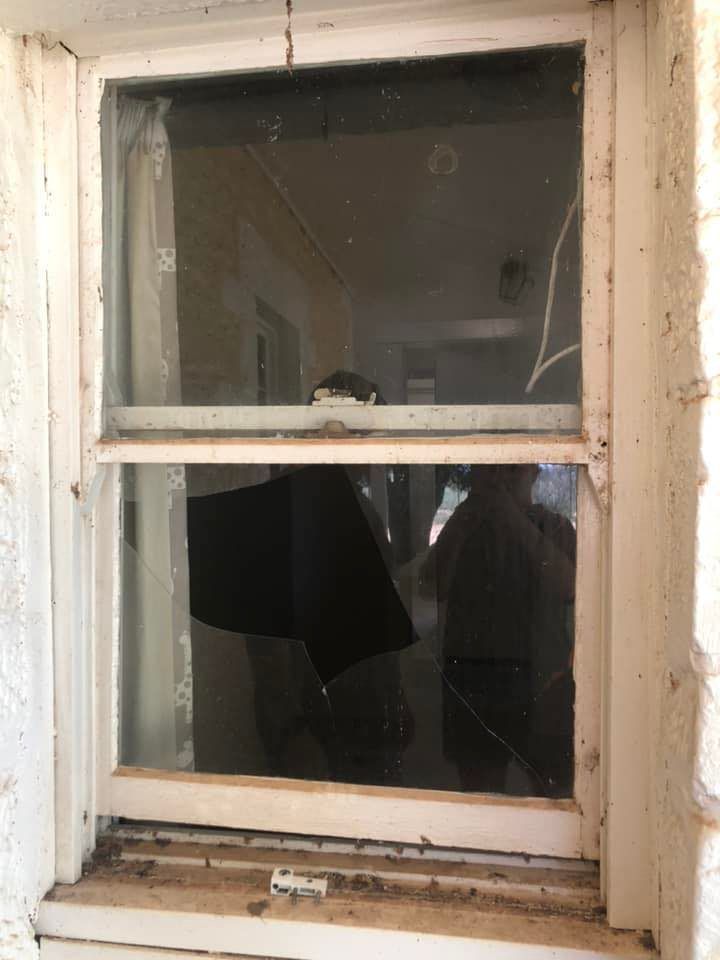 Old Window with Broken Glass — Glass Repairs in Dubbo, NSW