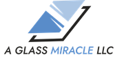 Logo of A Glass Miracle LLC, featuring a geometric design with blue and black elements.