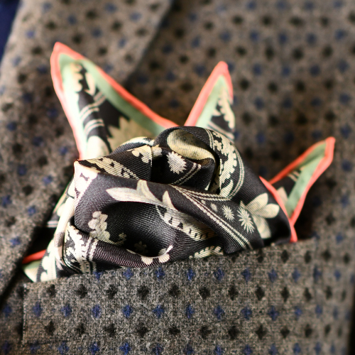 A celebrity wearing a womens silk scarf