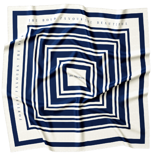 A model outside wearing a silk head scarf