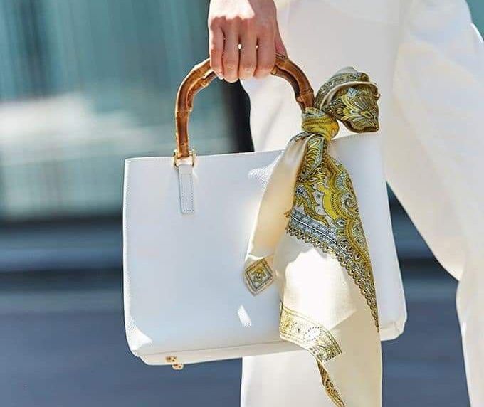 silk scarf around a bag