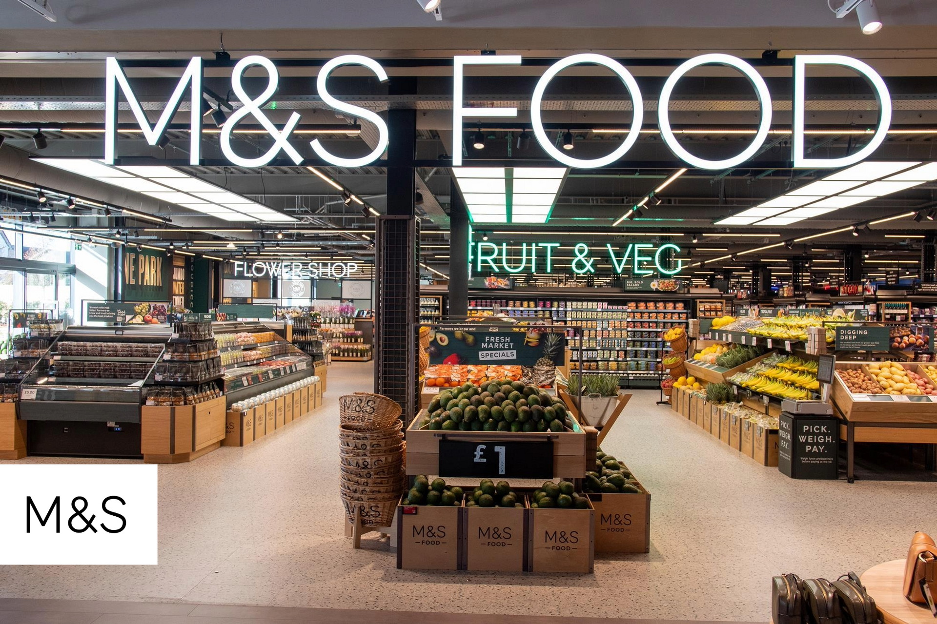 A m & s food store with lots of fruits and vegetables