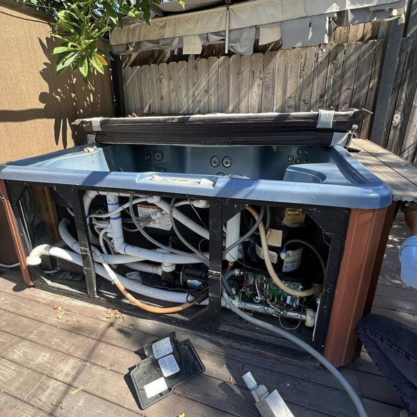 removing an old hot tub in Anaheim CA, bryan and sons junk removal and demolition