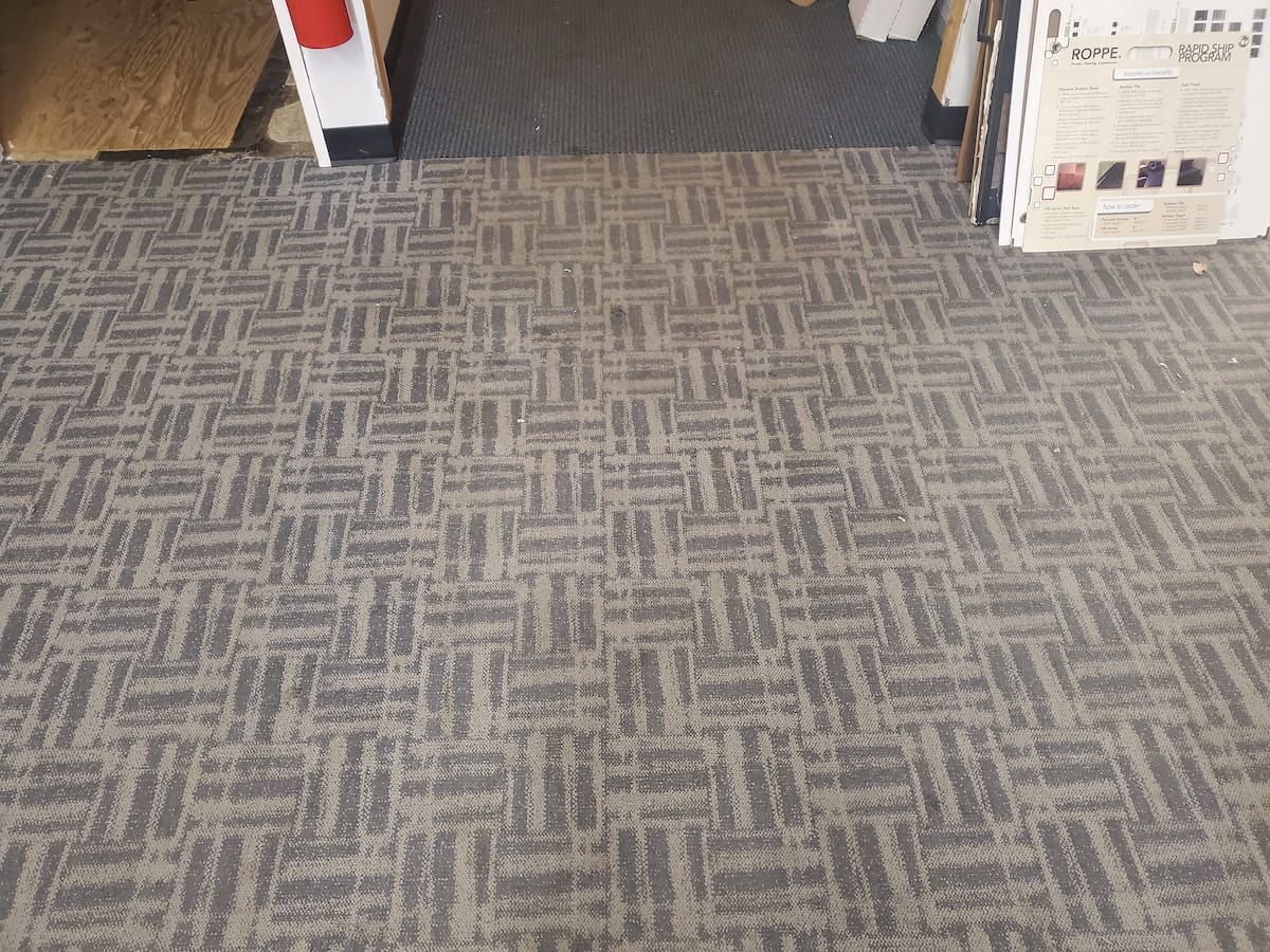 Pattern definition restored and embedded soil removed using commercial-grade hot water extraction. Carpet extended 2-3 years of service life at ~20% of replacement cost—saving this business over $3,000.