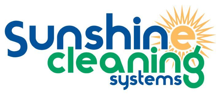 Logo for Sunshine Cleaning Systems, with text in blue and green, a sun graphic.