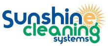 Sunshine Cleaning Systems logo: Blue and green text with a sun graphic.