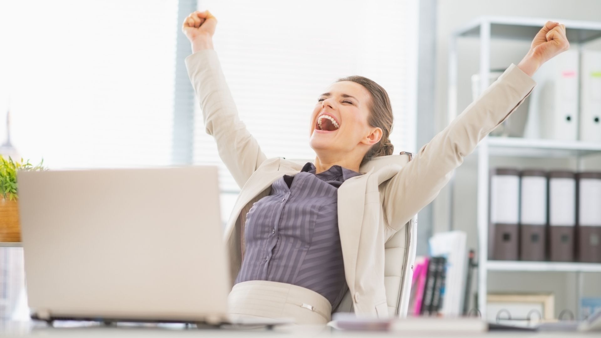 Woman Expressing Joy in Business