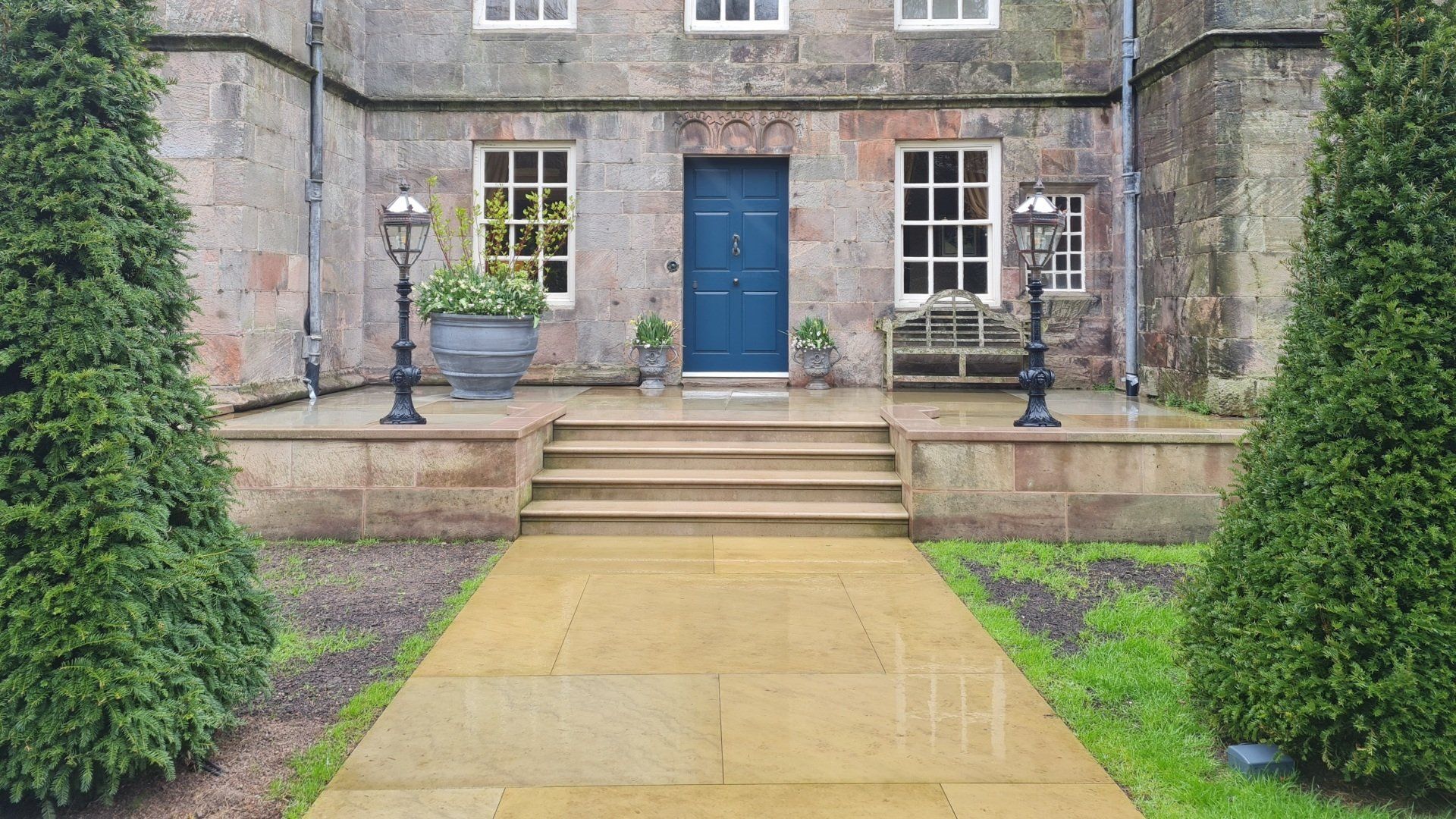Large york flag stones leading to natural stone steps made from Derbyshire sandstone