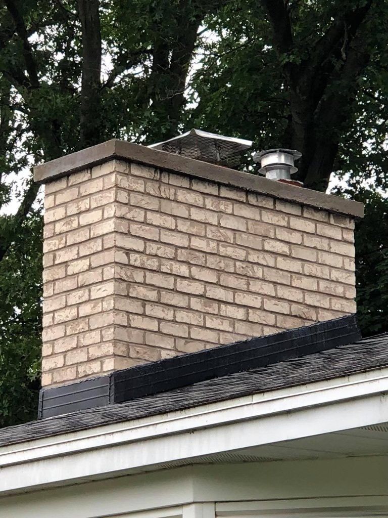 Difference Between Chimney Dampers and Caps