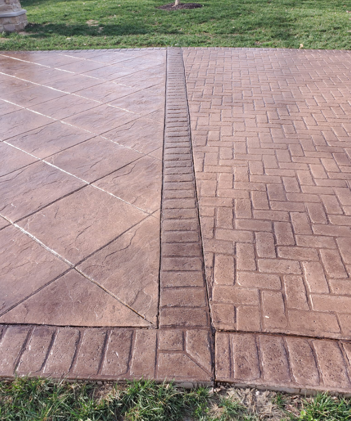 Stamped concrete patio with diamond and brick patterns, brown color.