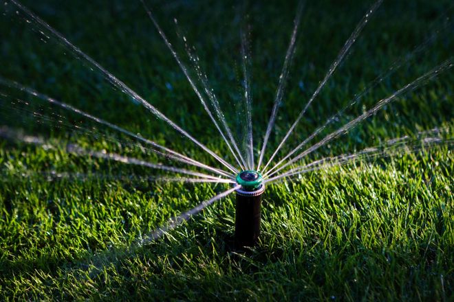 Sprinkler Watering Grass — Groveland, FL — South Lake Irrigation Inc.