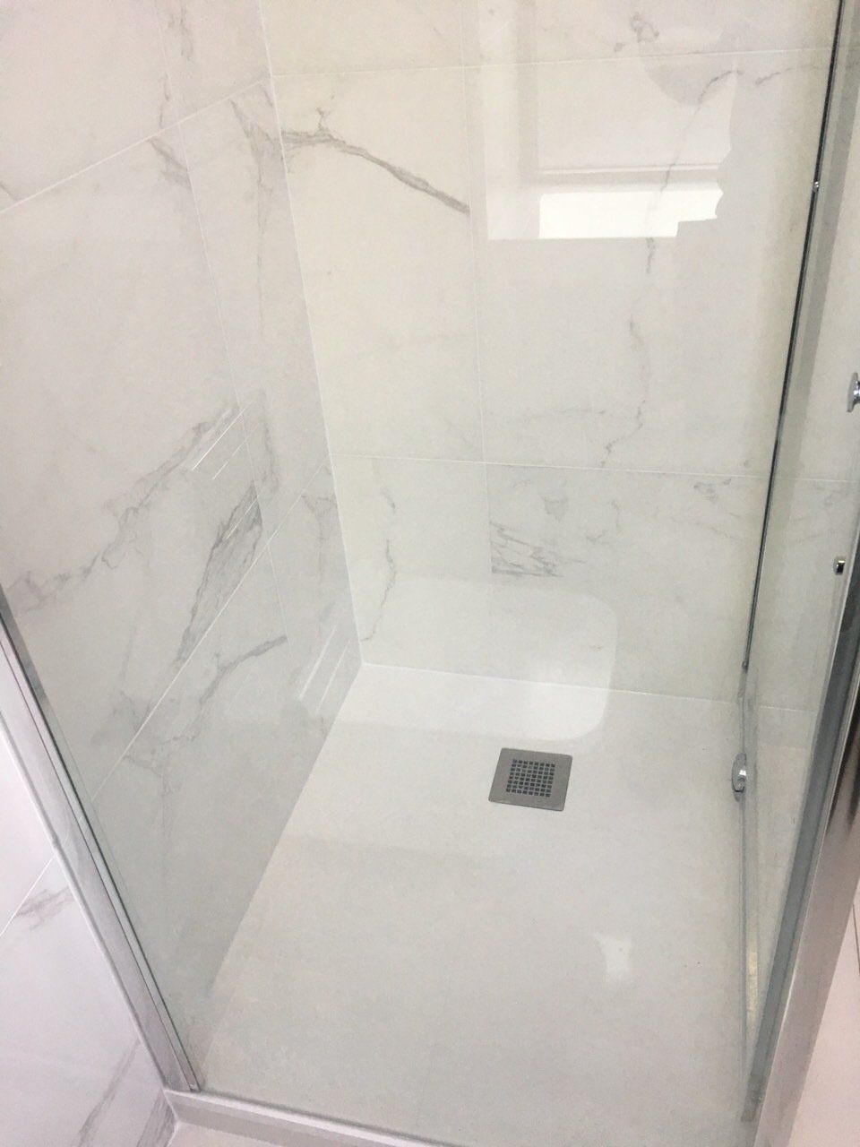 White slate tray, marble tiles, bathroom renovation