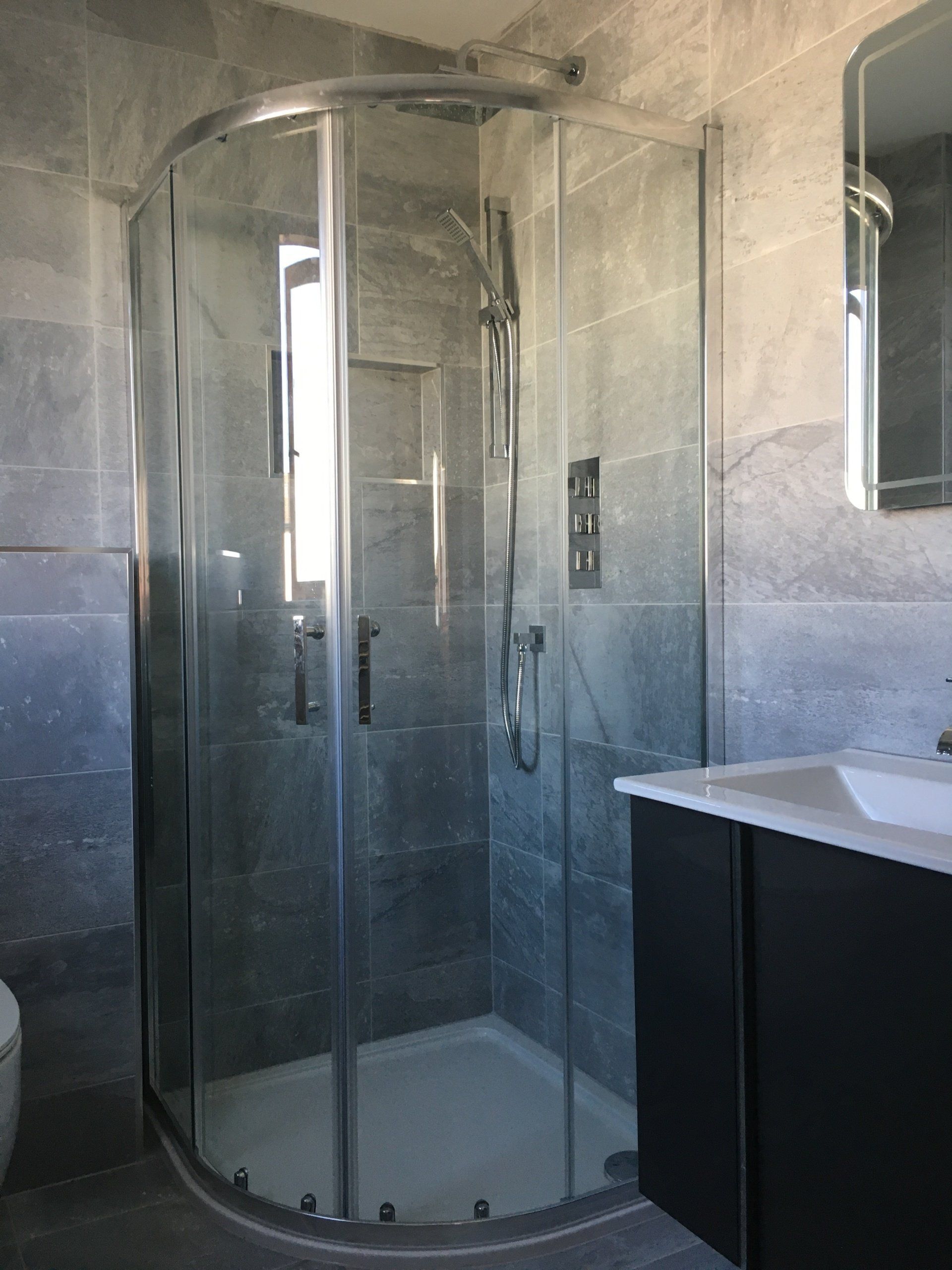 Quadrant shower, grey tiles, bathroom renovation Dublin