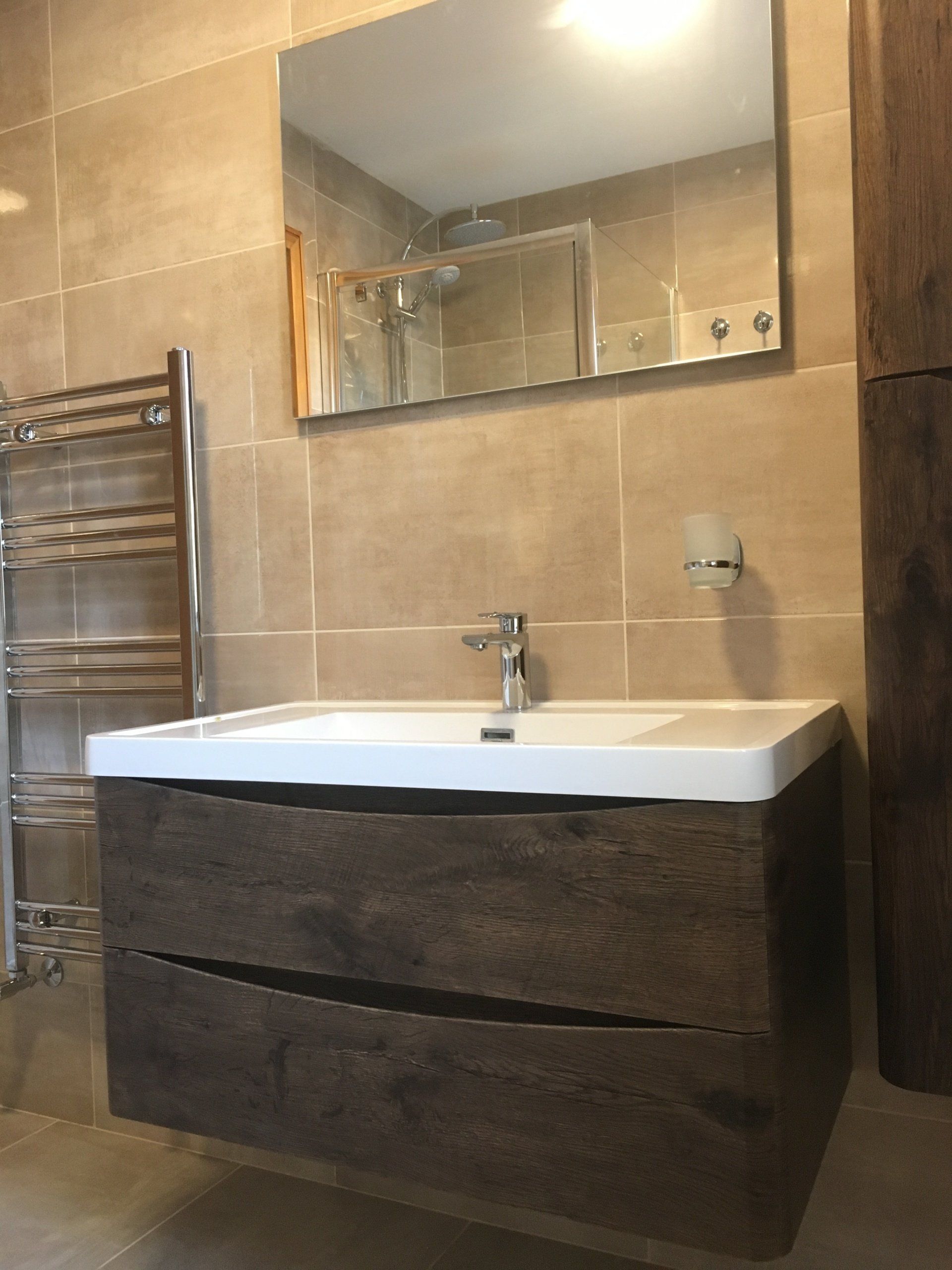Bathroom renovation, wall hung vanity unit, Griffeen Bathrooms, heated towel rail, taupe wall tiles