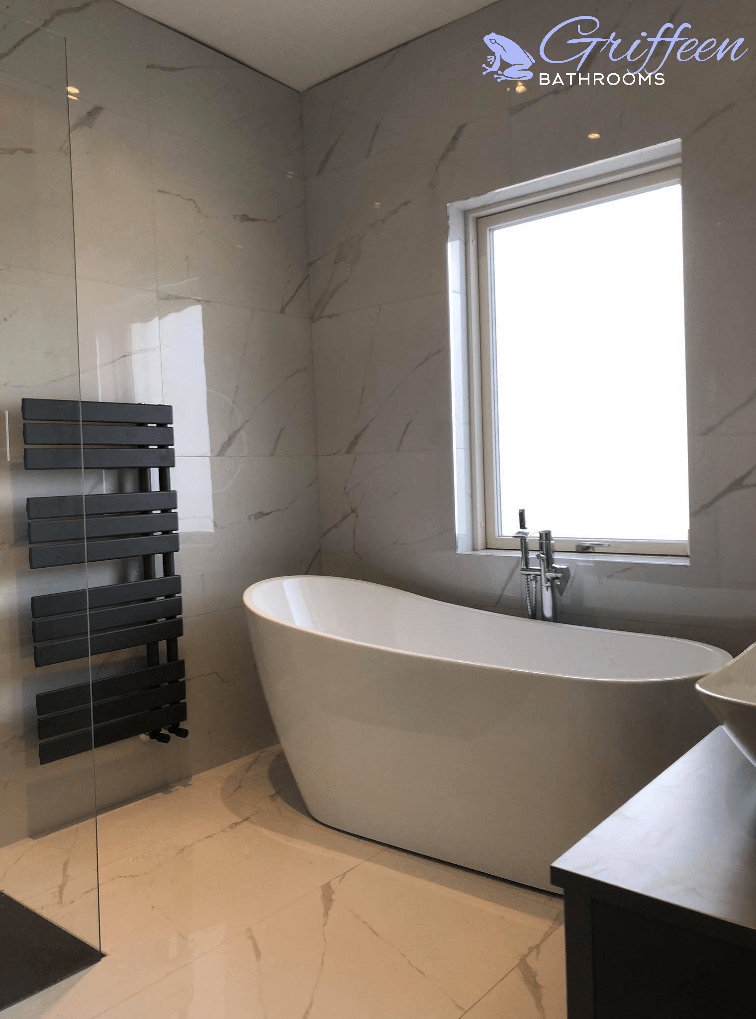 free standing bath, anthracite heated towel rail, marble tiles, carrara tiles, bathroom, bathroom renovation, dublin