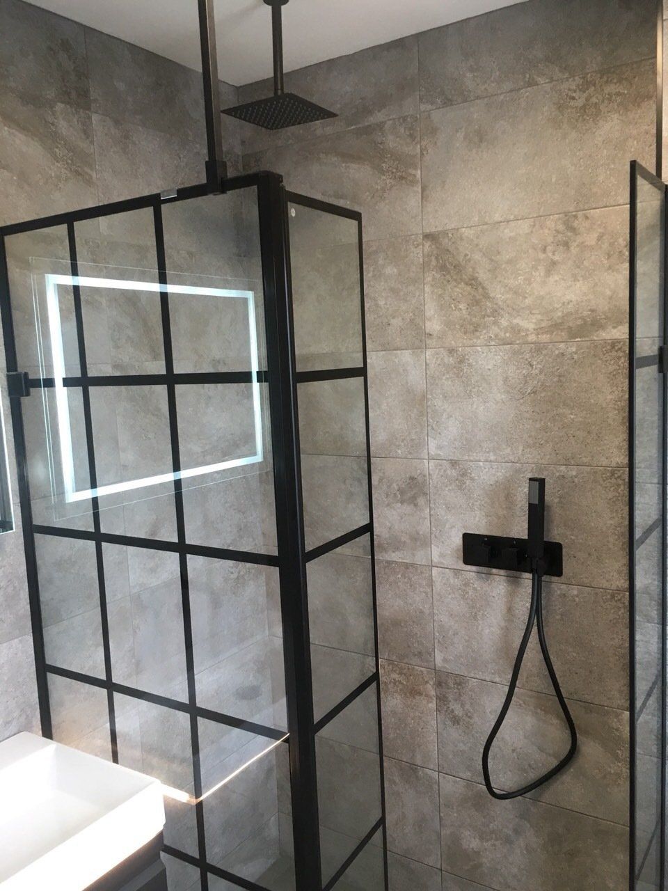 Black wetroom panel, black shower