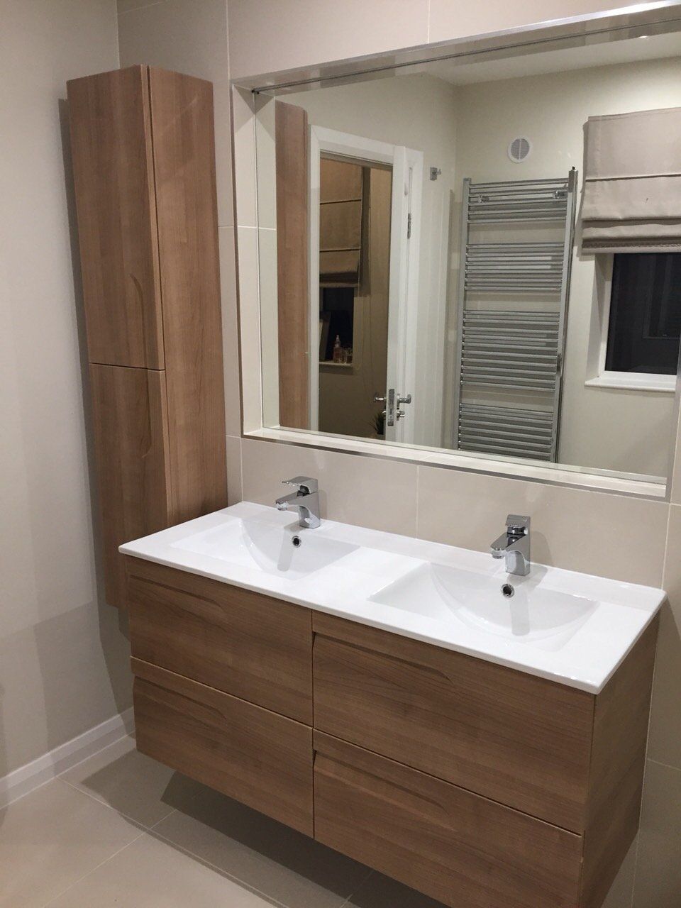 Walnut wall hung double vanity unit and tall boy
