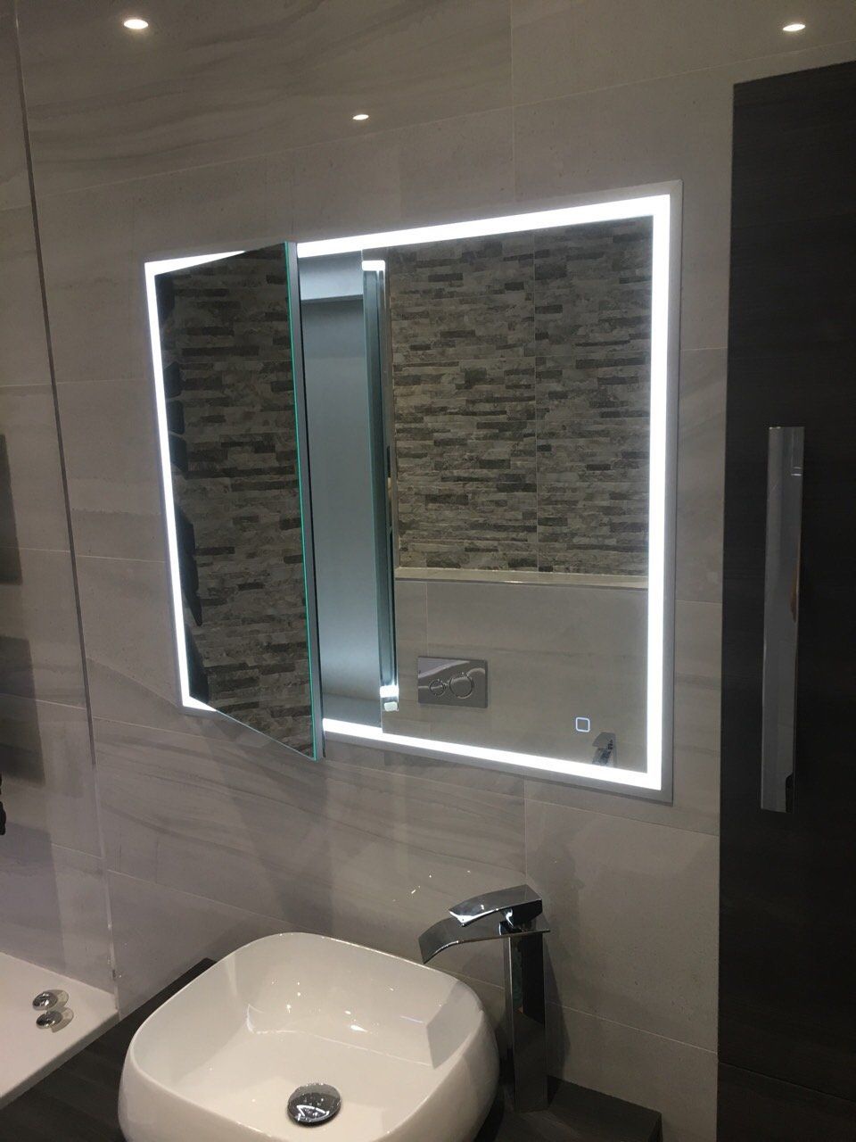 luxury HIB concealed bathroom mirror cabinet with light and counter top basin, grey tiles