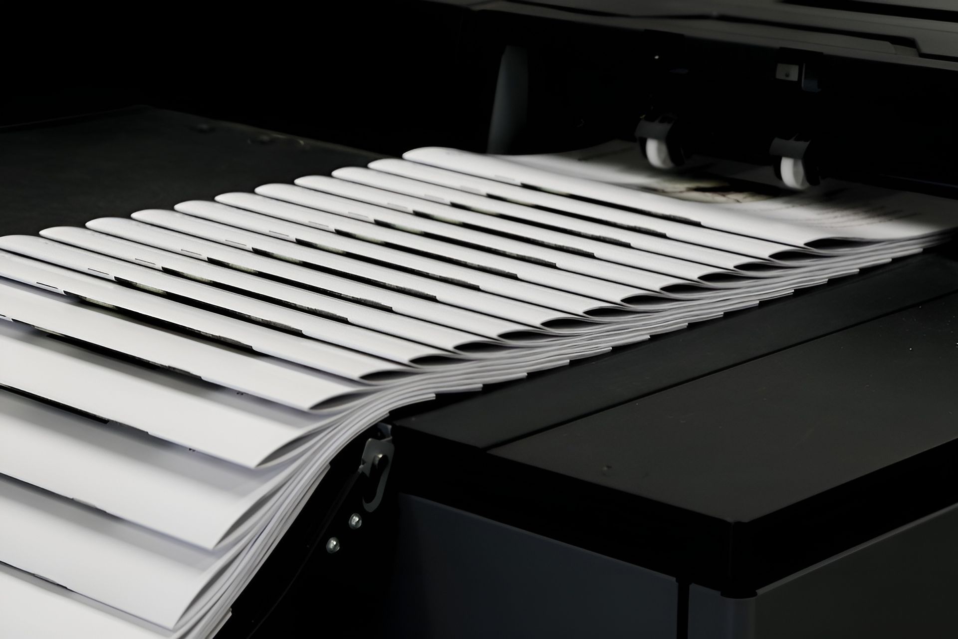 Papers Exiting a Printer, Stacked Neatly in A Pile — Digi Print Pro in Ballina, NSW