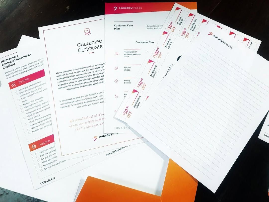 Papers and A Letter in An Orange Folder, with Red Accents, on A Dark Surface — Digi Print Pro in Mullumbimby, NSW